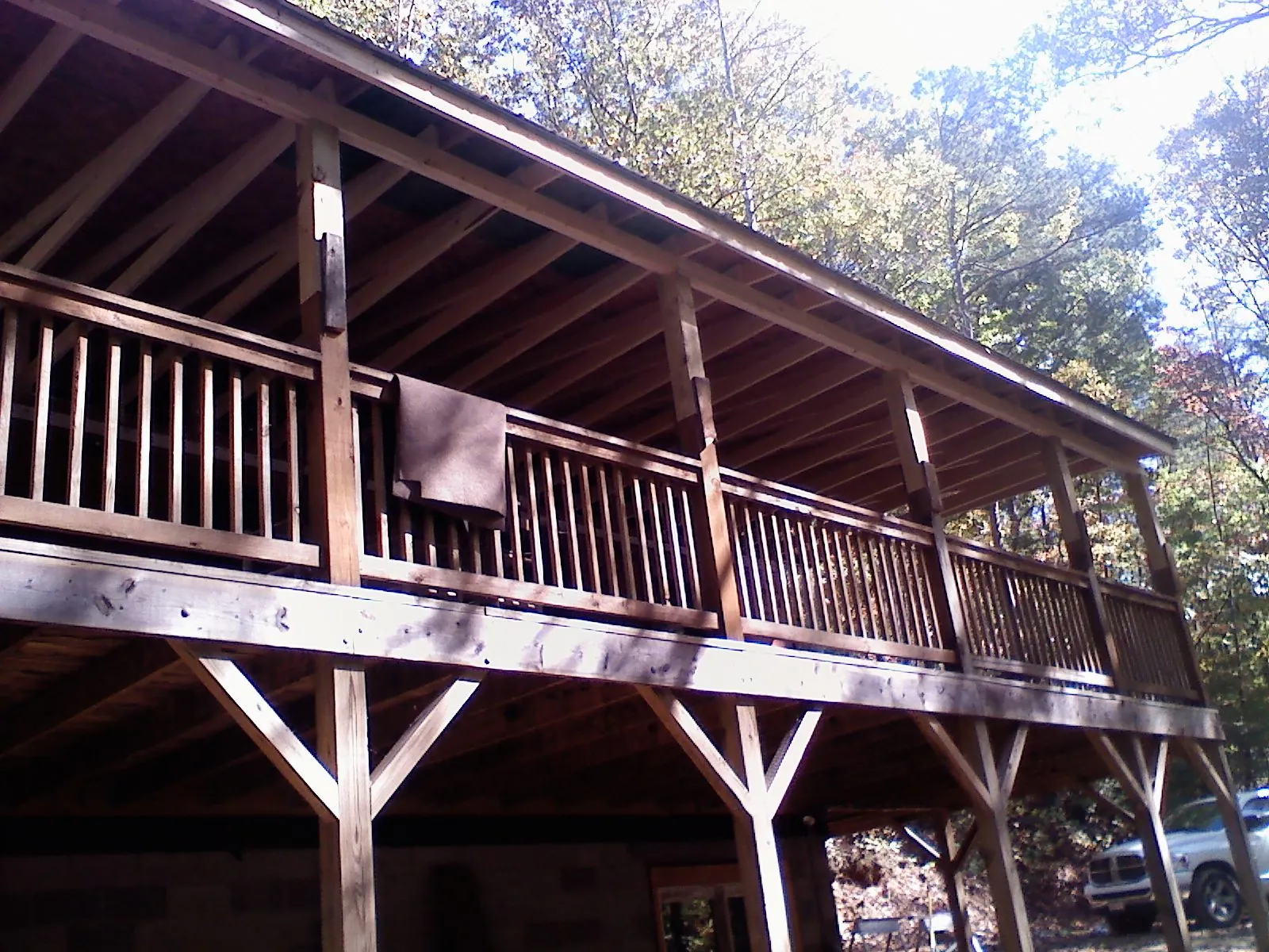 Timber framing under a new elevated porch and deck — Roof Leak Repair in Dola by Roofing Brothers